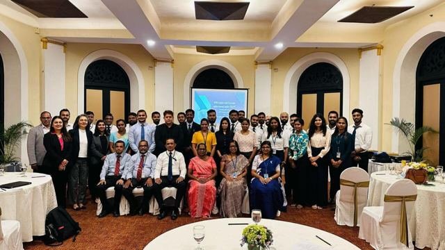 Participants and resource persons at an awareness workshop